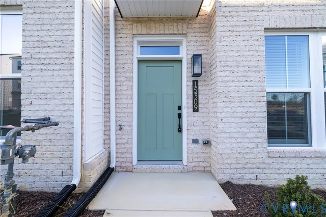 a view of front door of house and window