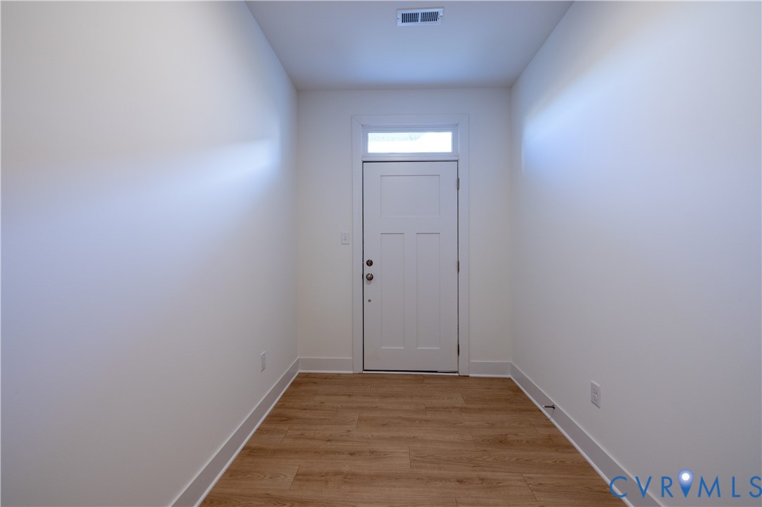 15309 Sunray Alley Chesterfield, VA 23832 - Photo 6 of 50 a view of a small space with wooden floor