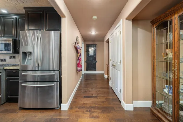 a living room with furniture chandelier and a chandelier