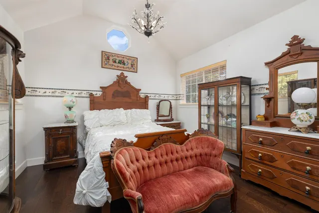 a balcony with table and chairs