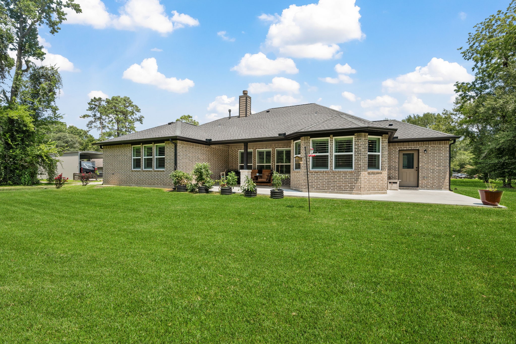 3004 Tyler Street Dayton, TX 77535 - Photo 27 of 34 a front view of a house with garden