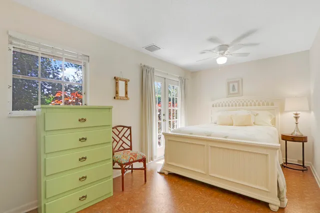 a bedroom with a bed and a cabinets