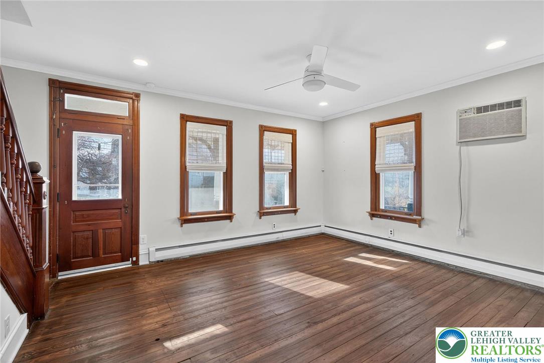 49 East Cherry Road Quakertown, PA 18951 - Photo 18 of 54 a view of an empty room with wooden floor and a window
