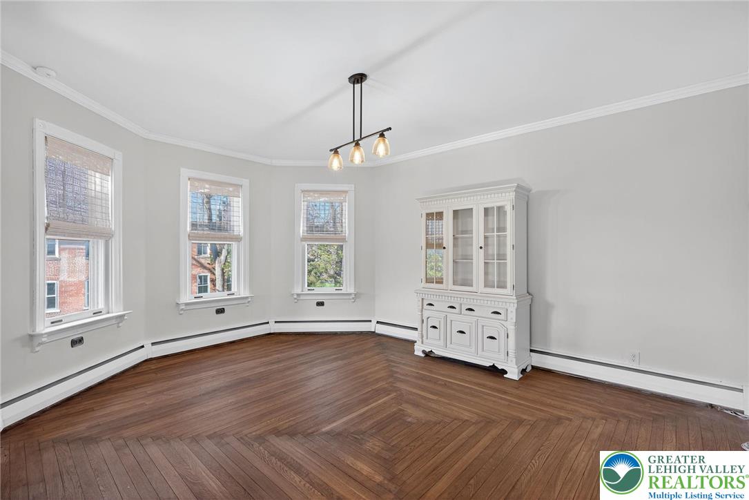 49 East Cherry Road Quakertown, PA 18951 - Photo 19 of 54 a view of an empty room with window and wooden floor