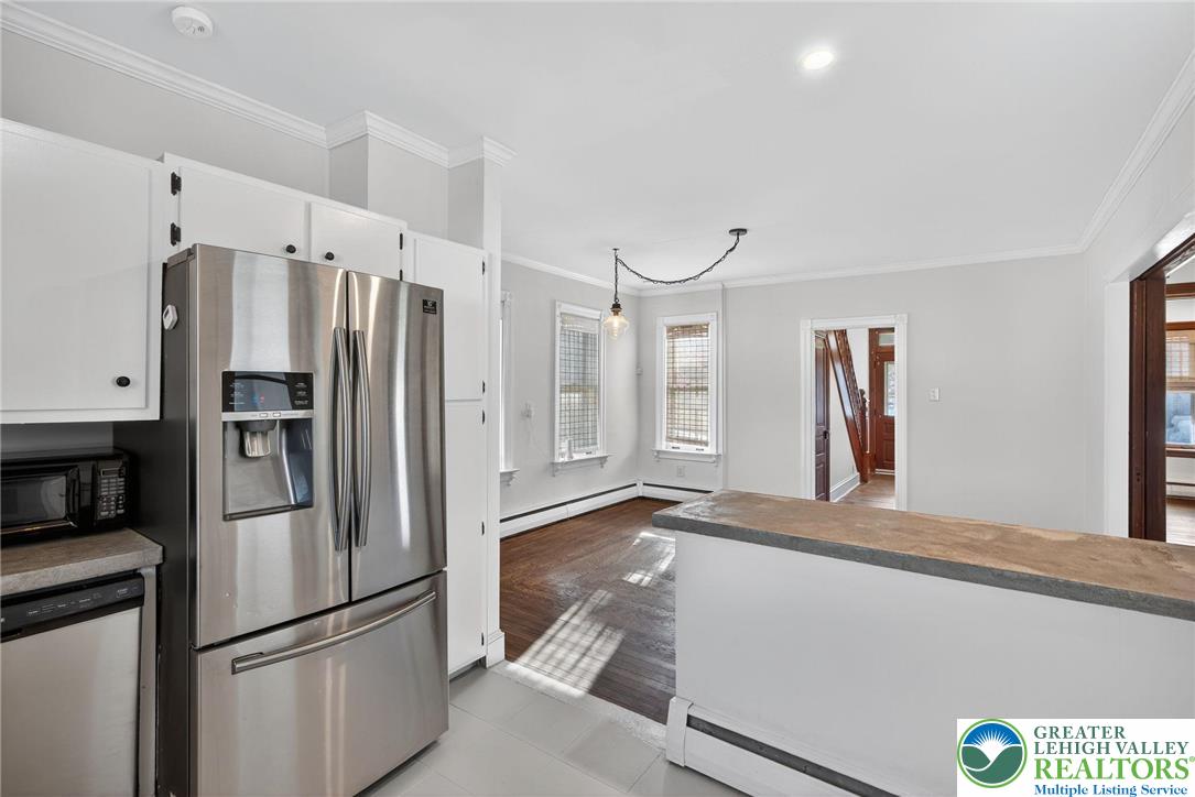 49 East Cherry Road Quakertown, PA 18951 - Photo 30 of 54 a kitchen with stainless steel appliances a refrigerator and a refrigerator