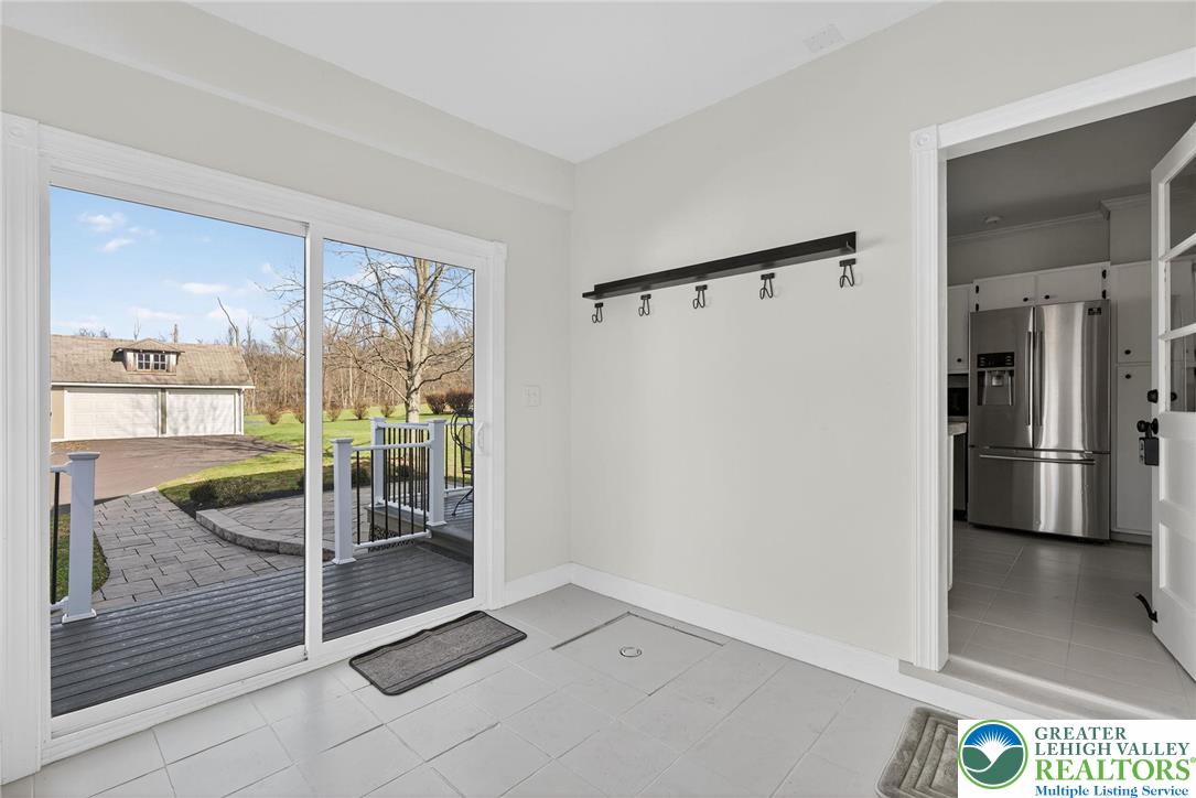 49 East Cherry Road Quakertown, PA 18951 - Photo 34 of 54 a view of a hallway with a glass door and shower