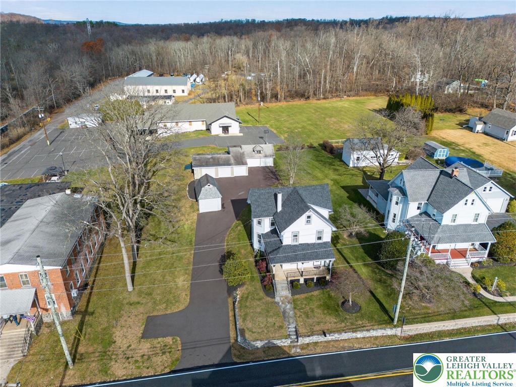 49 East Cherry Road Quakertown, PA 18951 - Photo 4 of 54 a view of swimming pool with seating area