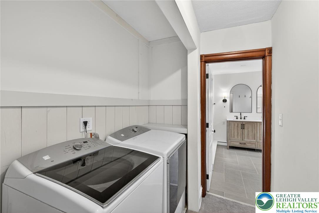 49 East Cherry Road Quakertown, PA 18951 - Photo 43 of 54 a bathroom with a sink vanity and mirror