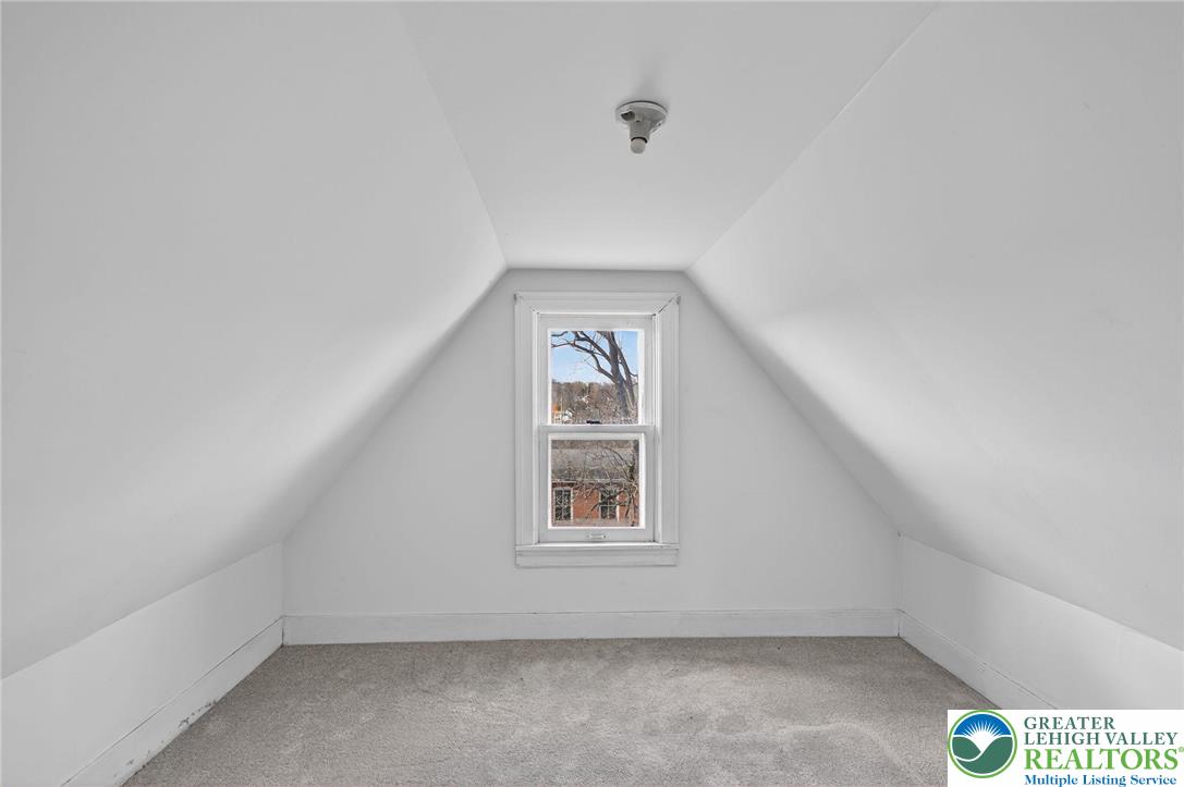 49 East Cherry Road Quakertown, PA 18951 - Photo 49 of 54 a view of an empty room with windows