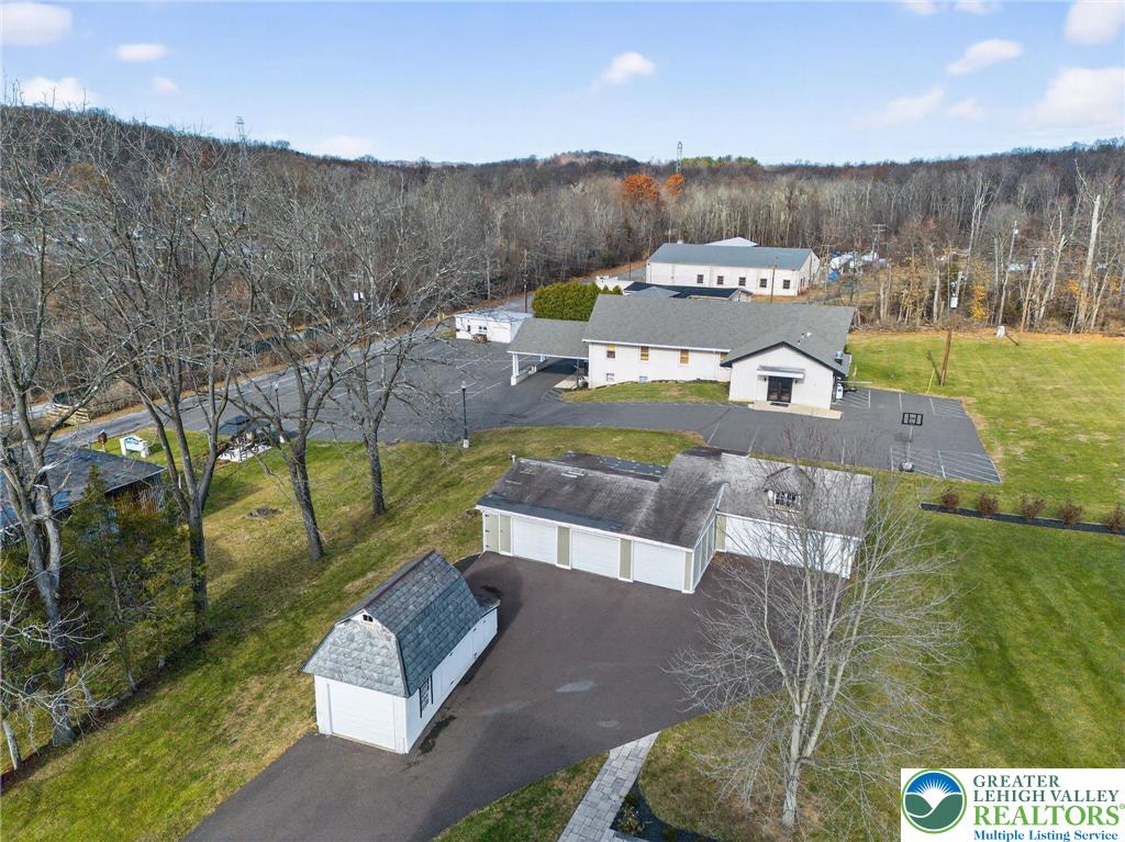 49 East Cherry Road Quakertown, PA 18951 - Photo 6 of 54 a view of swimming pool outdoor seating and city view