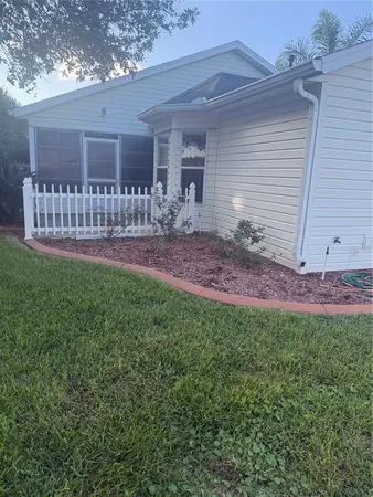 a view of a backyard with a garden