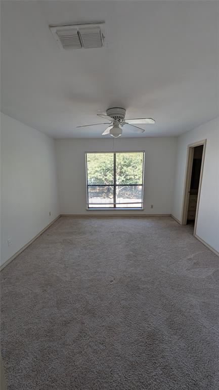 304 Benjamin Street Denton, TX 76207 - Photo 6 of 8 an empty room with a window