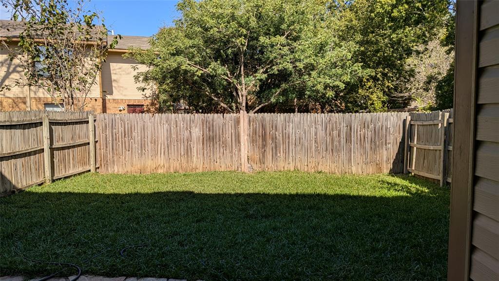 304 Benjamin Street Denton, TX 76207 - Photo 8 of 8 a view of outdoor space with a garden