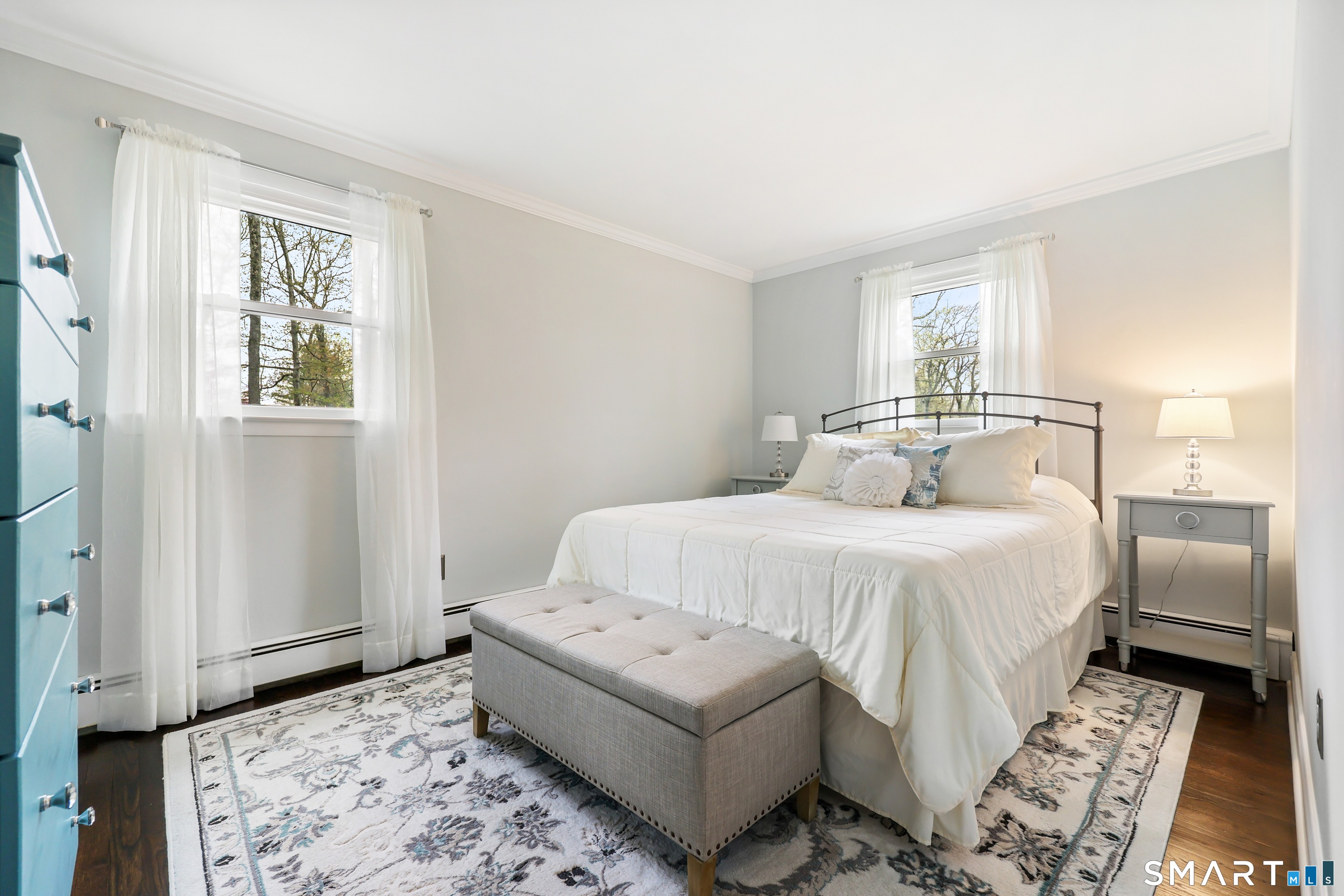 100 Flat Rock Drive Ridgefield, CT 06877 - Photo 20 of 40 a bedroom with a bed and a window