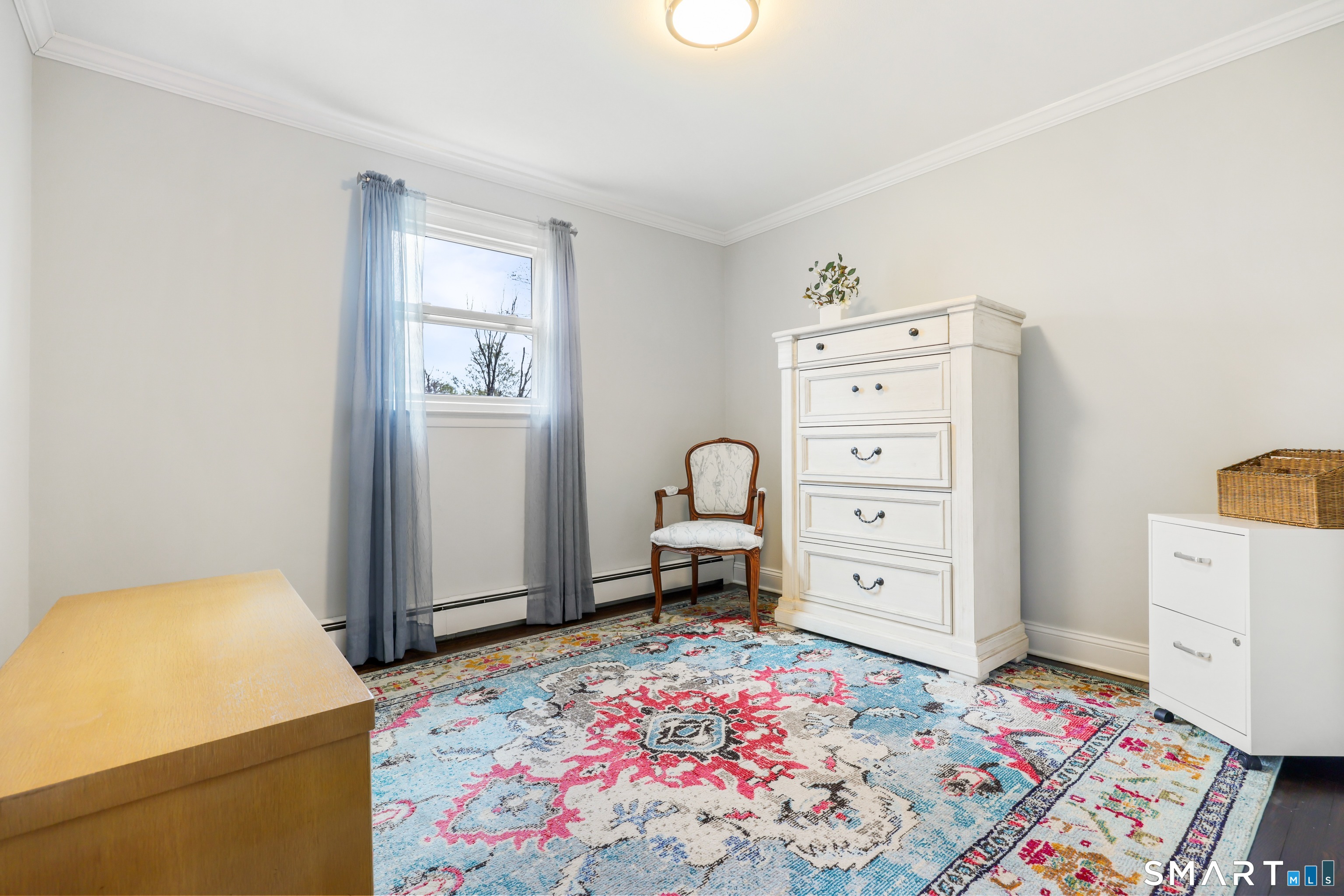 100 Flat Rock Drive Ridgefield, CT 06877 - Photo 21 of 40 a bedroom with a bed and furniture