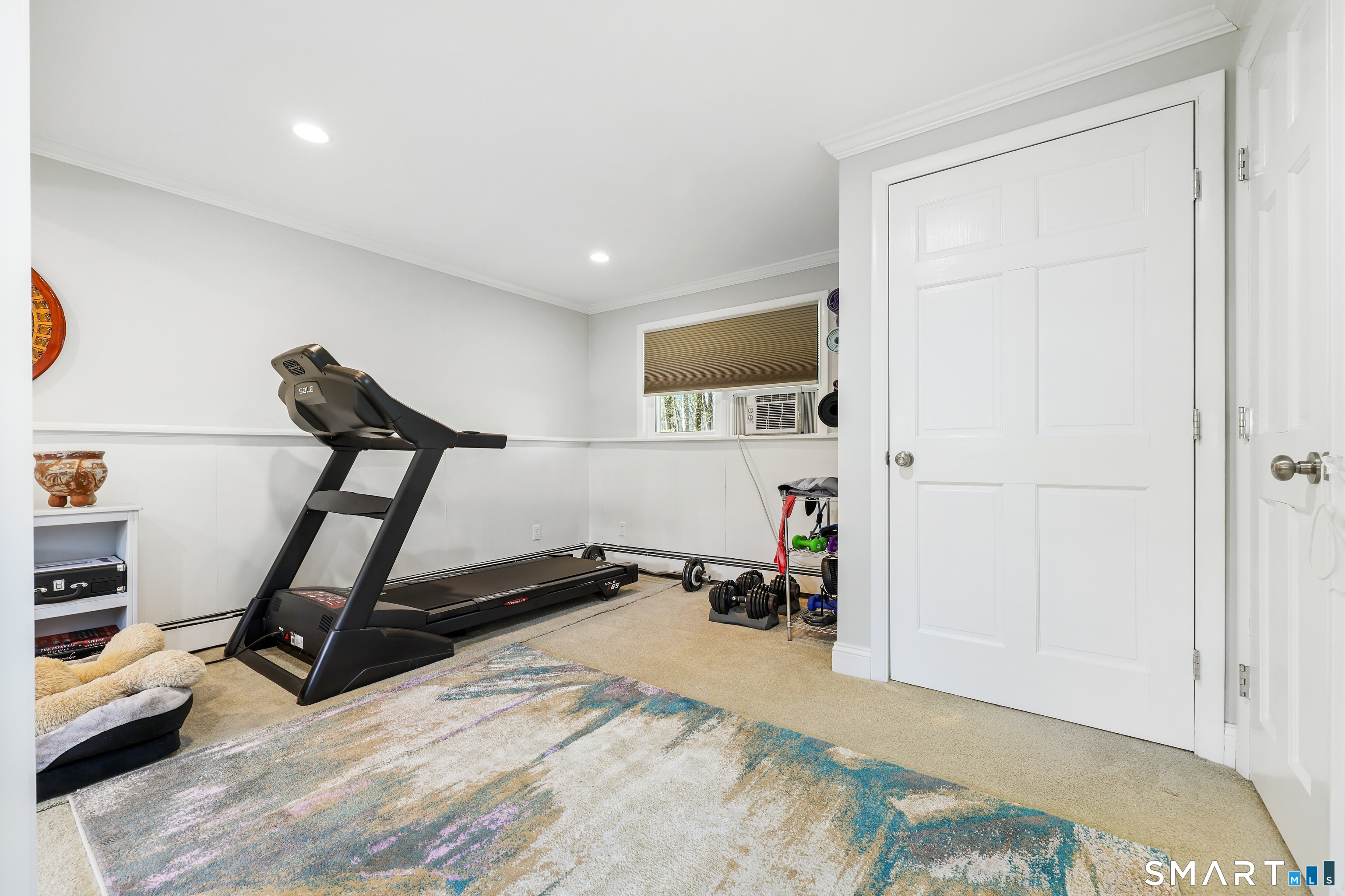 100 Flat Rock Drive Ridgefield, CT 06877 - Photo 24 of 40 a view of a room with gym equipment