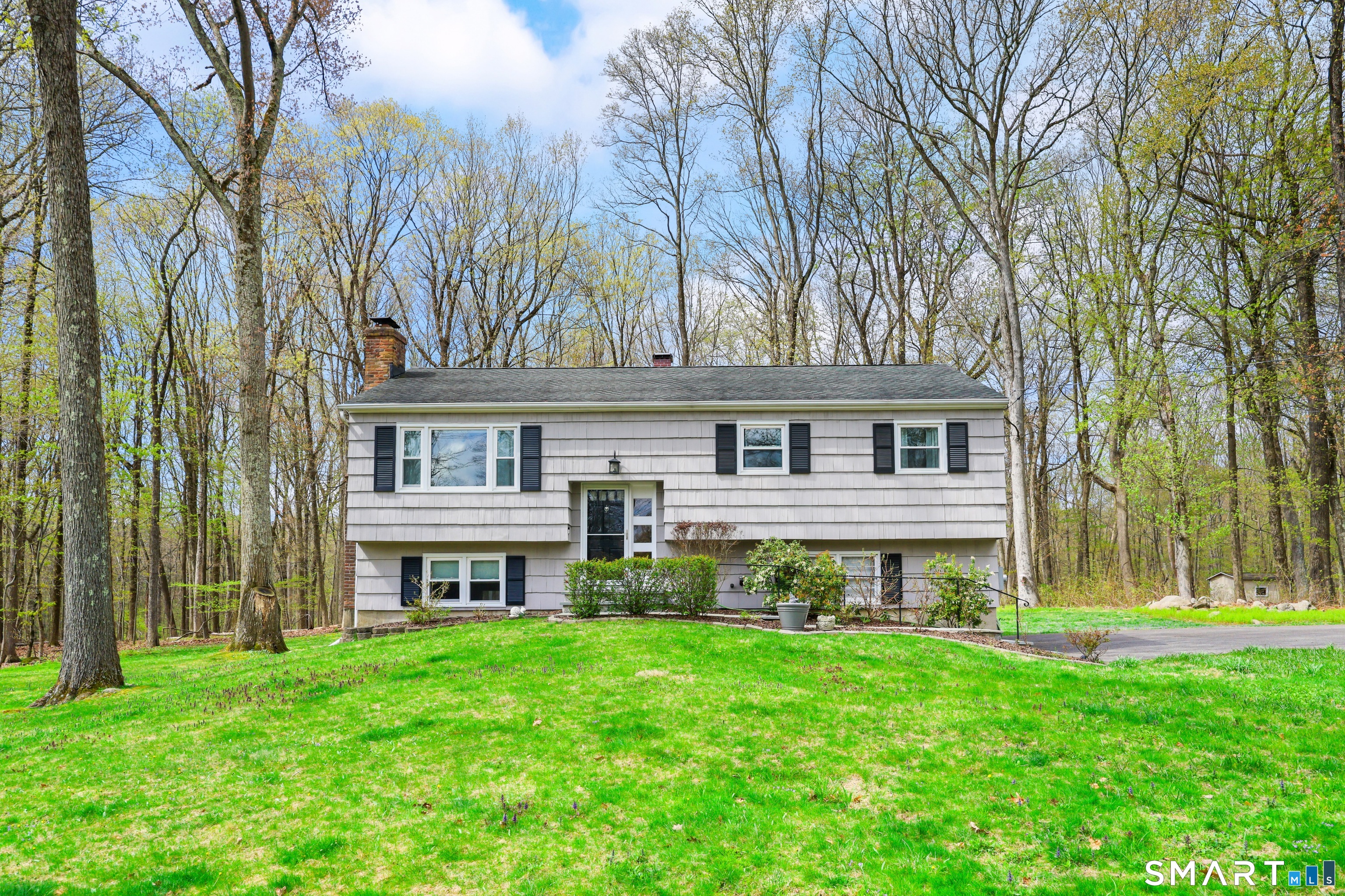 100 Flat Rock Drive Ridgefield, CT 06877 - Photo 38 of 40 front view of house with a yard