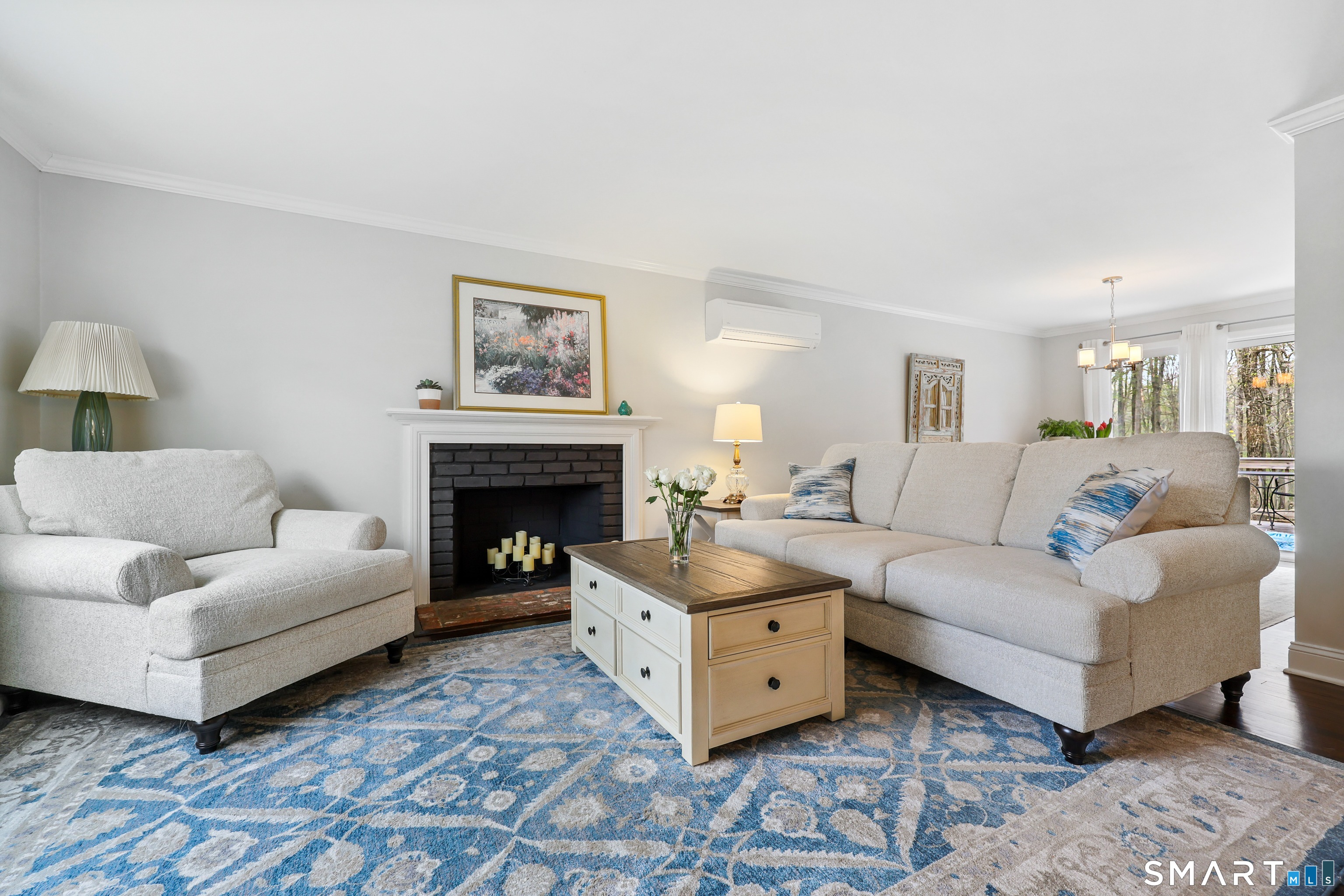 100 Flat Rock Drive Ridgefield, CT 06877 - Photo 10 of 40 a living room with furniture and a fireplace