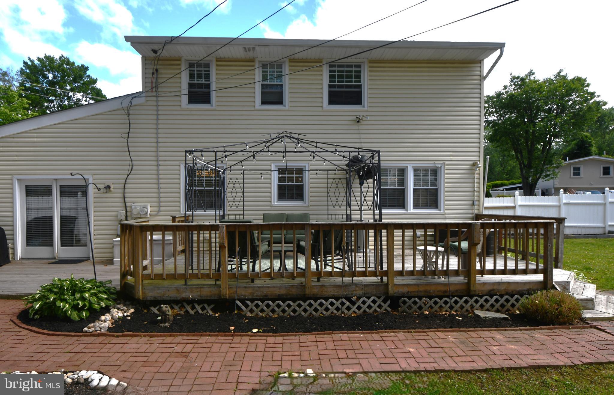 403 Bruce Road Feasterville-Trevose, PA 19053 - Photo 39 of 40 Back yard with deck, plenty of room for kids/pets