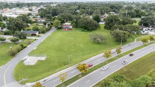 an aerial view of a golf course with a park