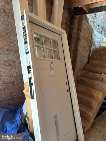 a view of an entryway with staircase