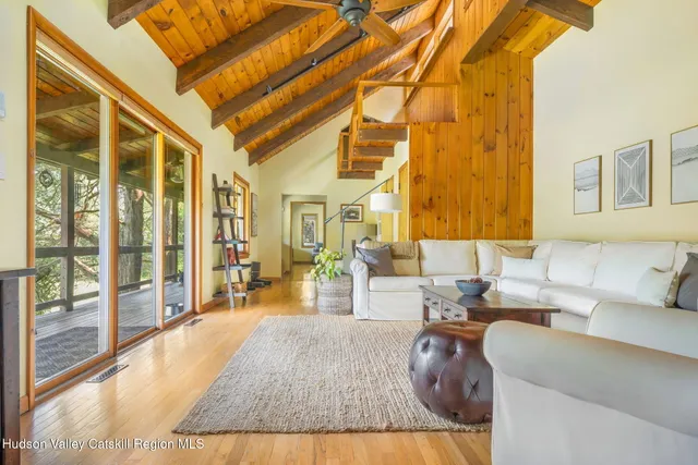 a living room with furniture and a table