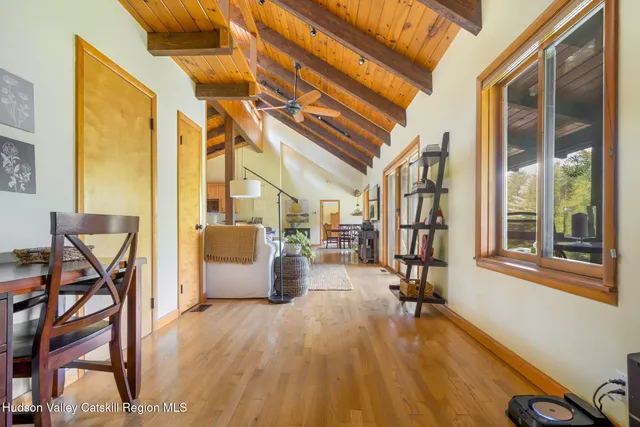 a kitchen with stainless steel appliances granite countertop a sink a stove and a microwave