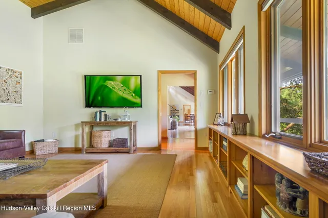 a view of balcony with wooden floor