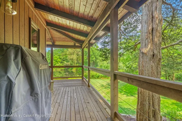 a view of a house with a yard and garage