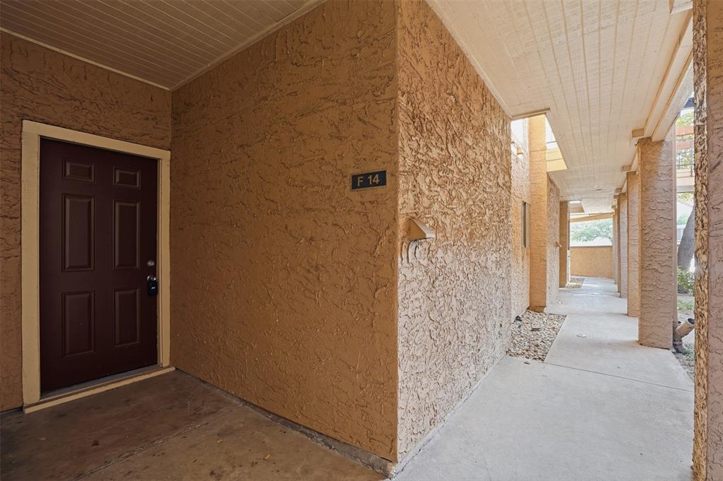 5550 Spring Valley Road, Unit F14 Dallas, TX 75254 - Photo 15 of 15 an empty room with windows