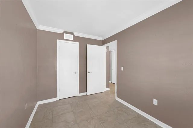 a bathroom with a granite countertop sink toilet a mirror and shower