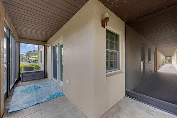 a view of a porch with a yard