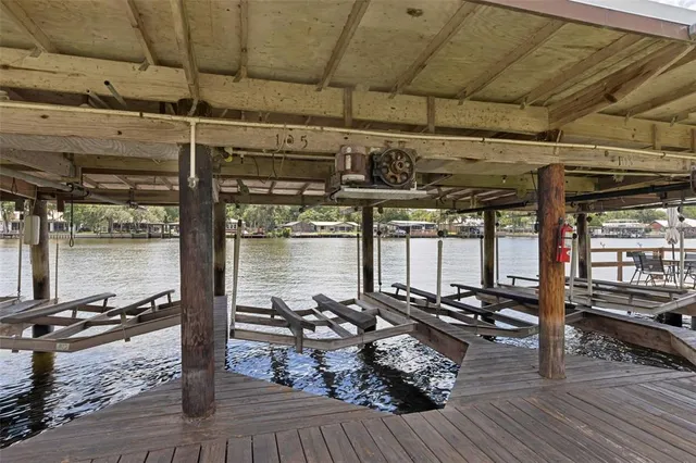 an aerial view of a house with a lake view