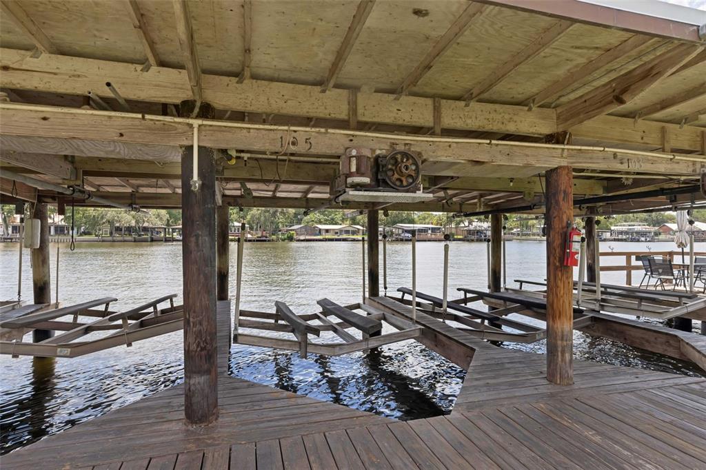 Undisclosed Address Astor, FL 32102 - Photo 23 of 28 a view of a garage with wooden floor