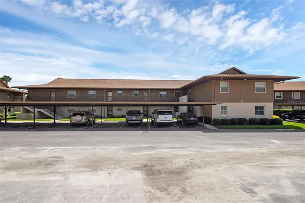 a front view of a house with garage