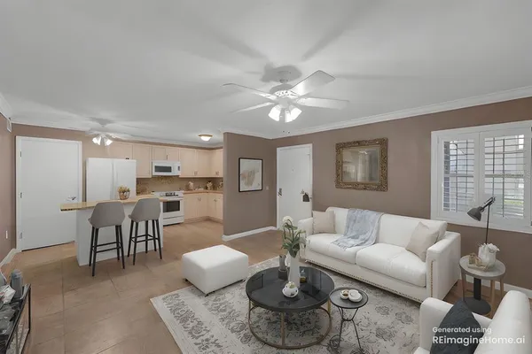 a kitchen with kitchen island granite countertop stainless steel appliances a sink refrigerator stove and microwave