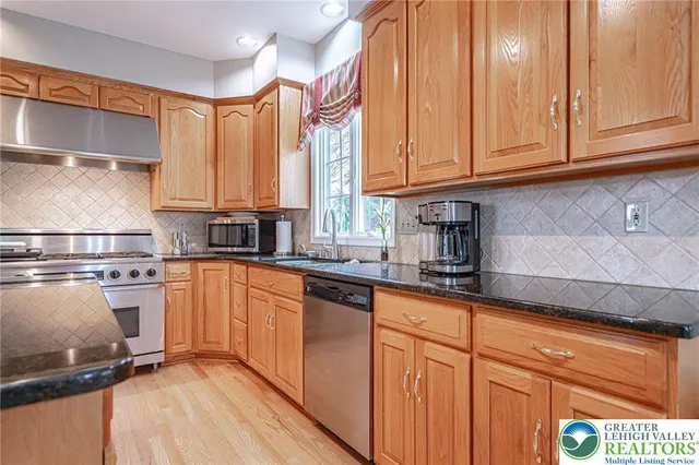 a bed room with a bed and a dresser