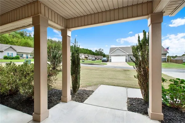 a view of a porch with a yard
