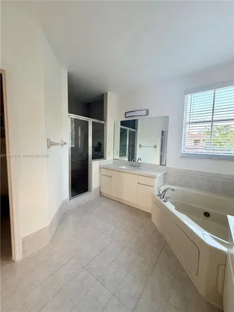 a room with gym equipment and a window