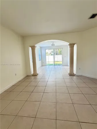 a view of a livingroom with white walls
