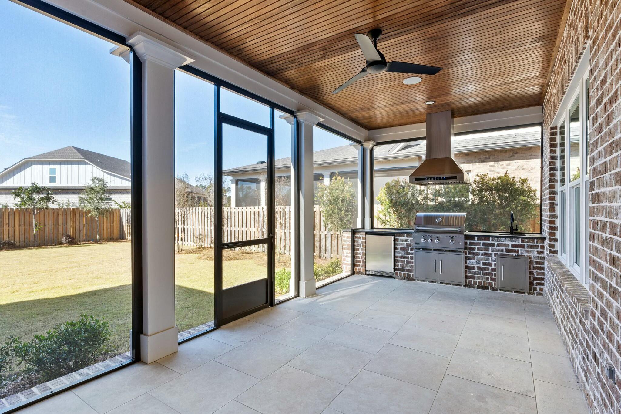 57 Revana Way Freeport, FL 32439 - Photo 21 of 28 57 Revana Way screened in patio