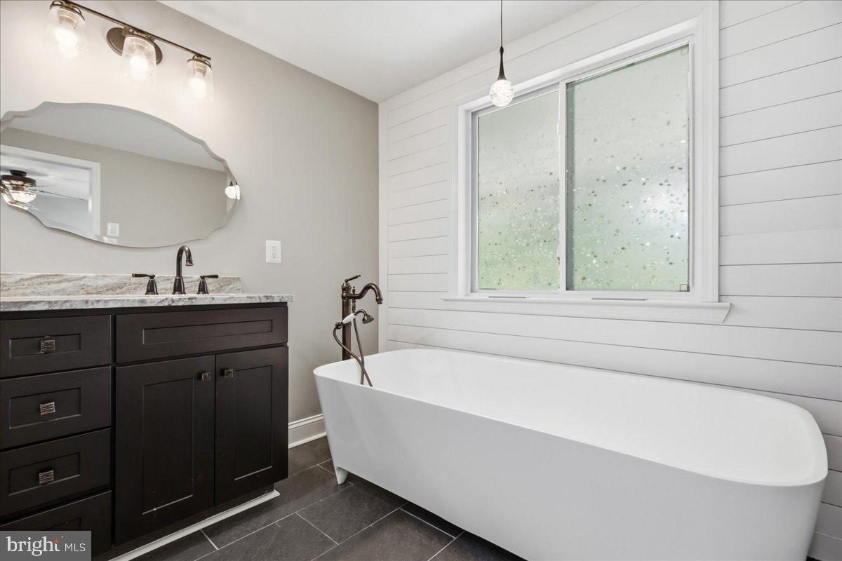 2175 Ponds Wood Road Huntingtown, MD 20639 - Photo 33 of 76 Elegant tub anchors the bath