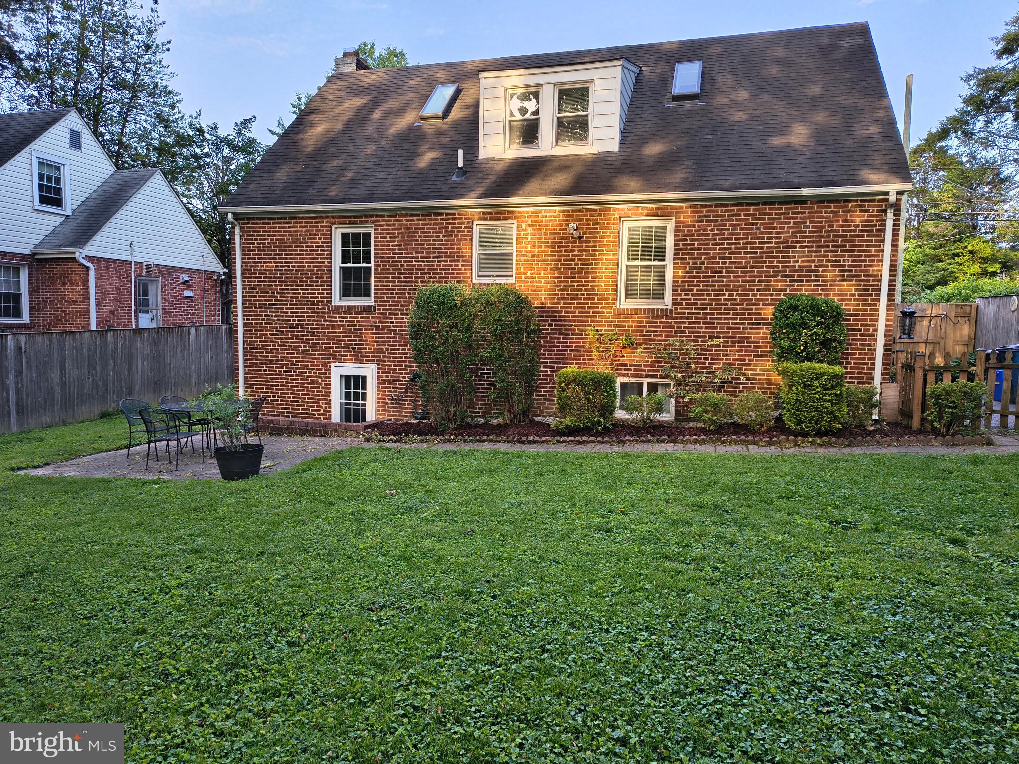 9316 Sudbury Road Silver Spring, MD 20901 - Photo 13 of 19 a front view of a house with garden