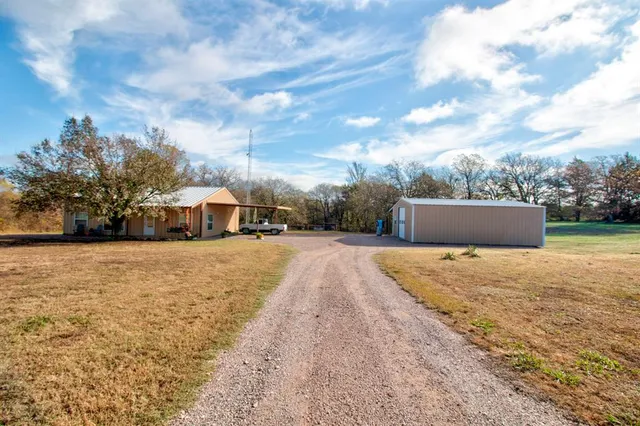 a view of street with houses