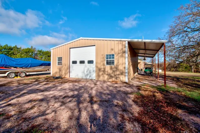 a view of an outdoor sitting area with furniture