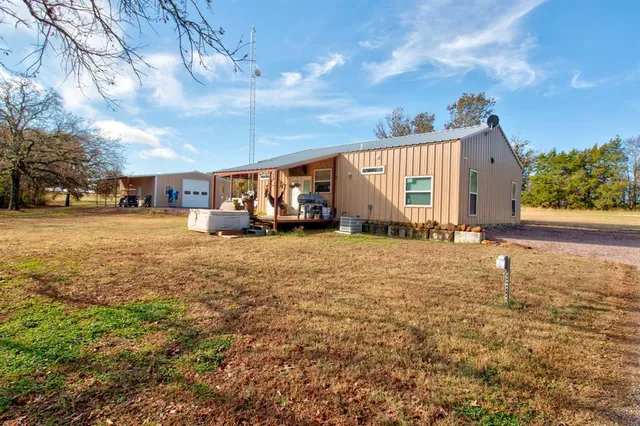 a house with trees in front of it