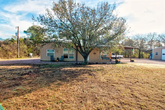 a house view with a outdoor space