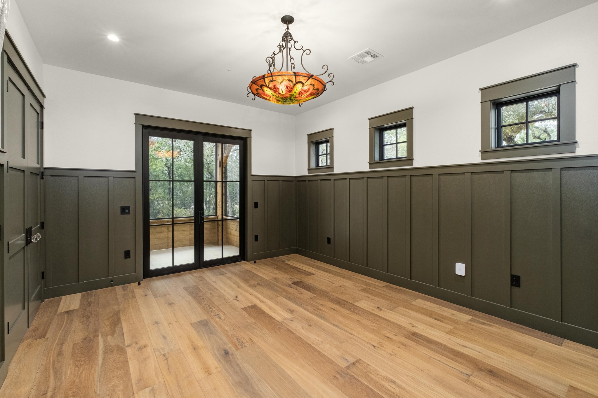 0 Old Red Ranch Road Dripping Springs, TX 78620 - Photo 28 of 40 a view of an empty room with window and wooden floor