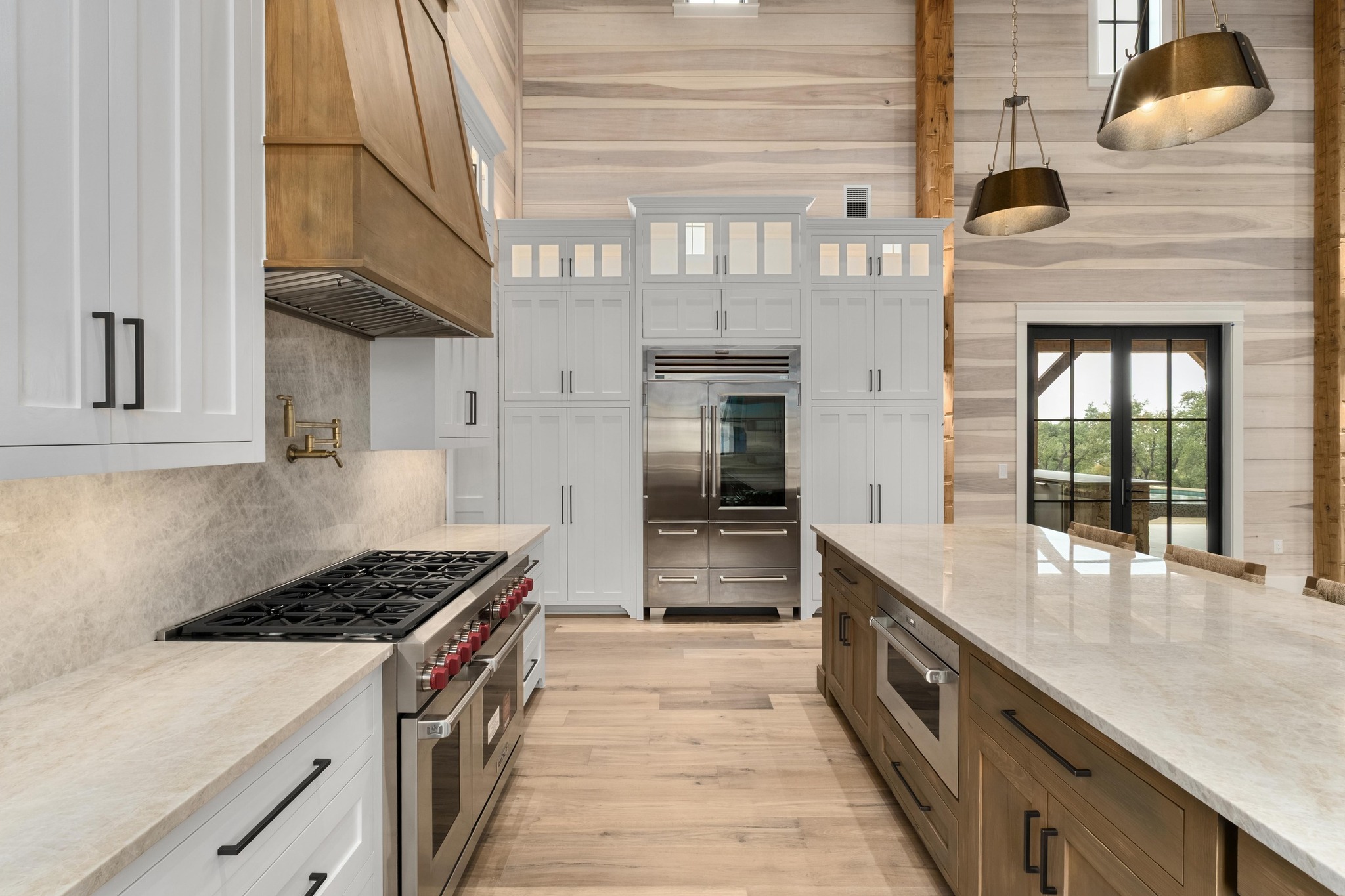 0 Old Red Ranch Road Dripping Springs, TX 78620 - Photo 8 of 40 a kitchen with stainless steel appliances granite countertop a stove and a sink