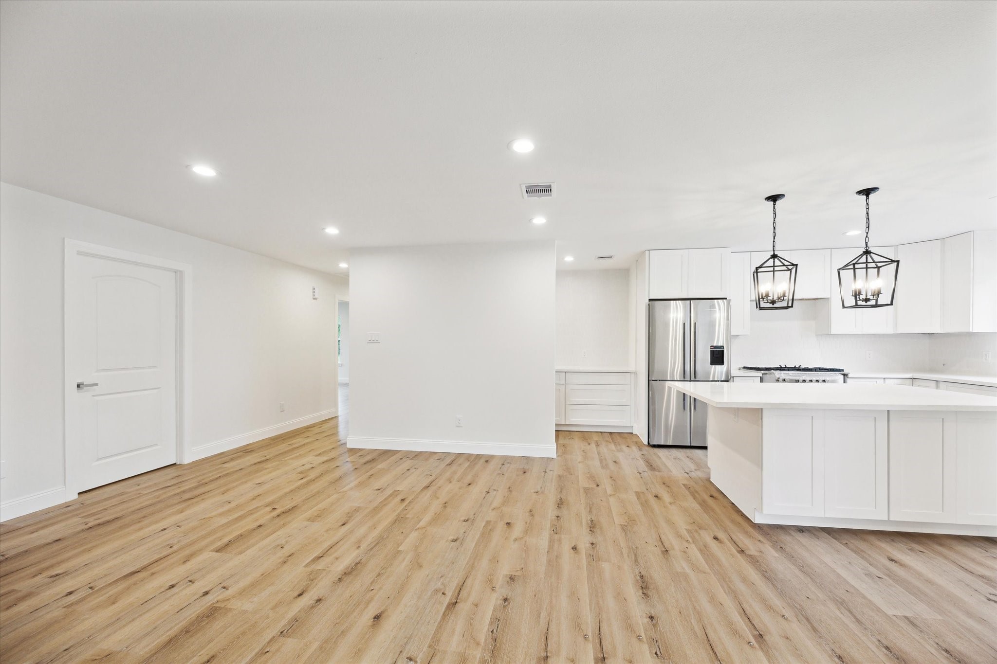 1935 Willow Road Wallis, TX 77485 - Photo 15 of 34 a view of a kitchen with wooden floor